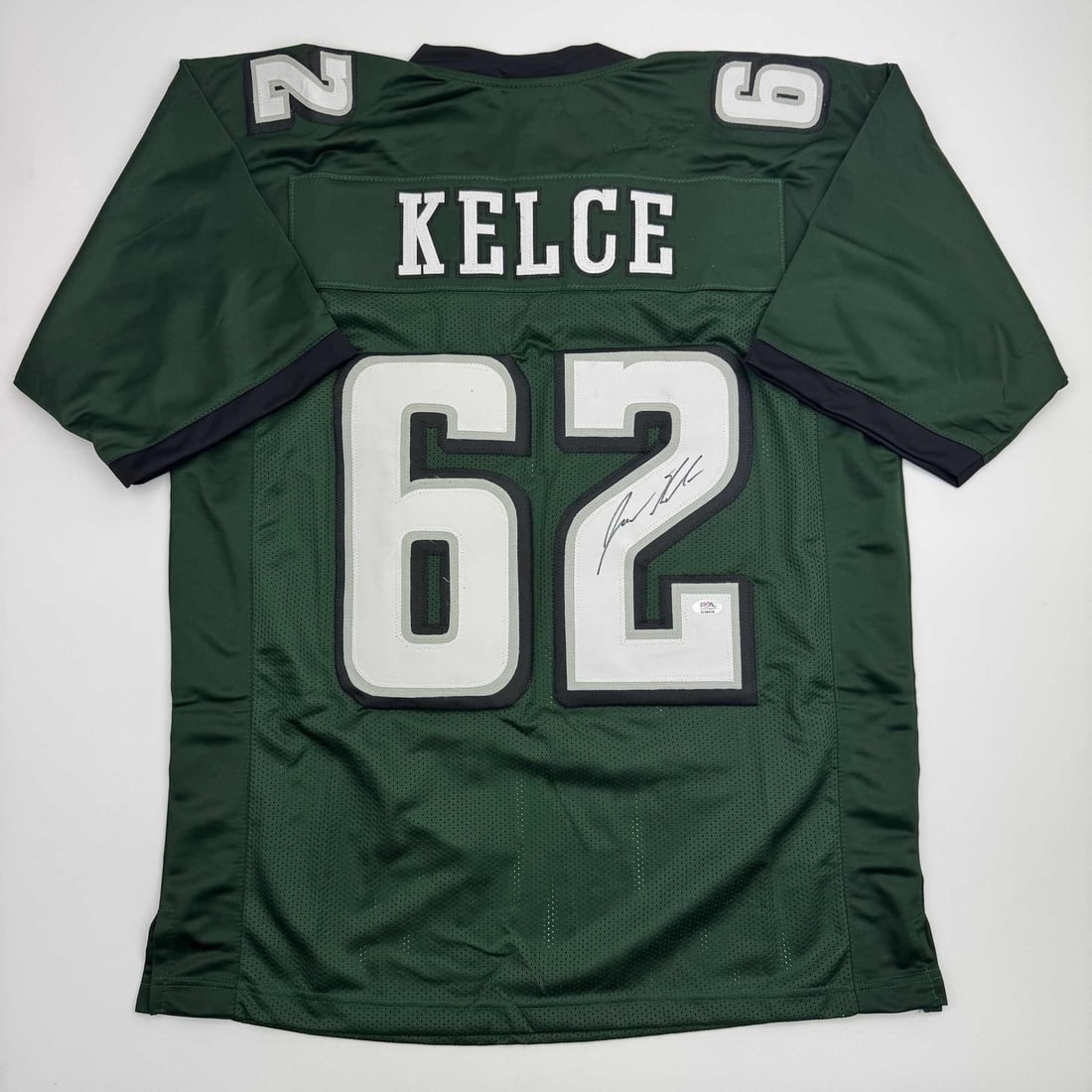 Jason Kelce Signed Eagles Green Football Jersey JSA: Jason Kelce Signed Eagles Green Football Jersey JSA Autographed Jason Kelce custom football jersey in green, intended as a collectible display piece. The jersey features the player's name and number a