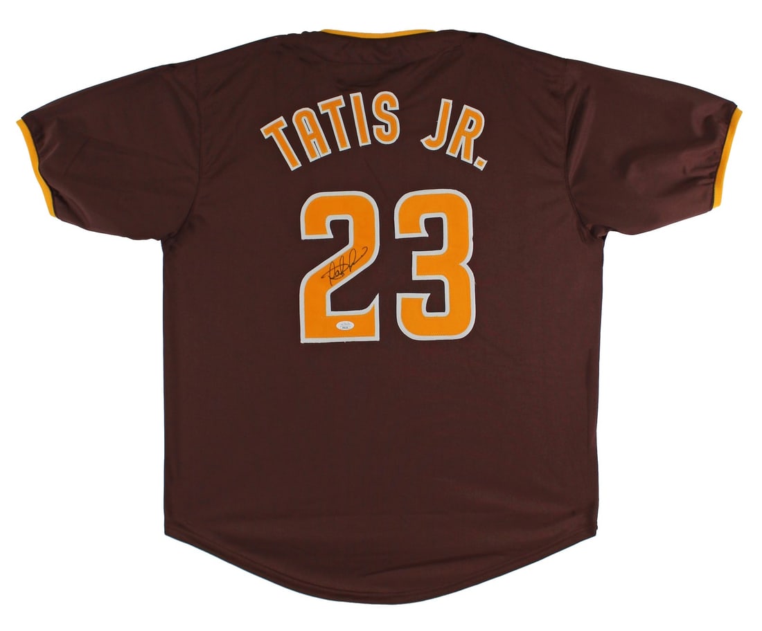JSA Certified Fernando Tatis Jr Signed San Diego Padres Brown Jersey: JSA Certified Fernando Tatis Jr Signed San Diego Padres Brown Jersey Authentic signed brown pro style jersey with yellow numbers, personally hand-signed by Fernando Tatis Jr. This original autograph i