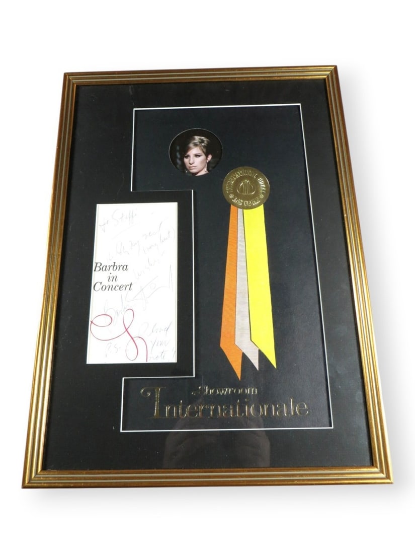 Beckett Authenticated Barbra Streisand Signed Program Page: Beckett Authenticated Barbra Streisand Signed Program Page This is an original program page autographed by Barbra Streisand, featuring her signature from a Las Vegas International event. The signed pa