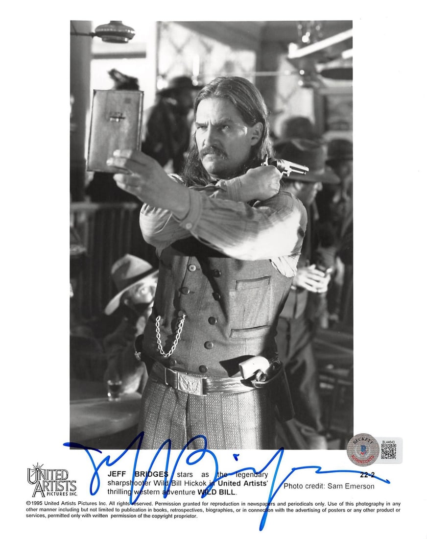 Jeff Bridges Wild Bill Signed 8x10 Photo with Beckett Authentication: Jeff Bridges Wild Bill Signed 8x10 Photo with Beckett Authentication Capture a piece of cinematic history with this authentic autographed 8x10 photo of Jeff Bridges from the film Wild Bill. This strik