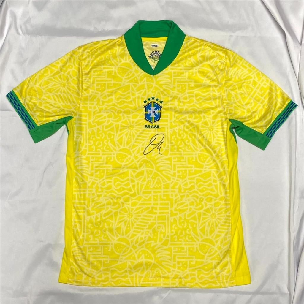 Brazil soccer jersey signed by Vinicius Junior JSA: Brazil soccer jersey signed by Vinicius Junior JSA This is an original Brazil national team jersey signed by Vinicius Junior, the renowned Real Madrid footballer. The autograph has been authenticated 