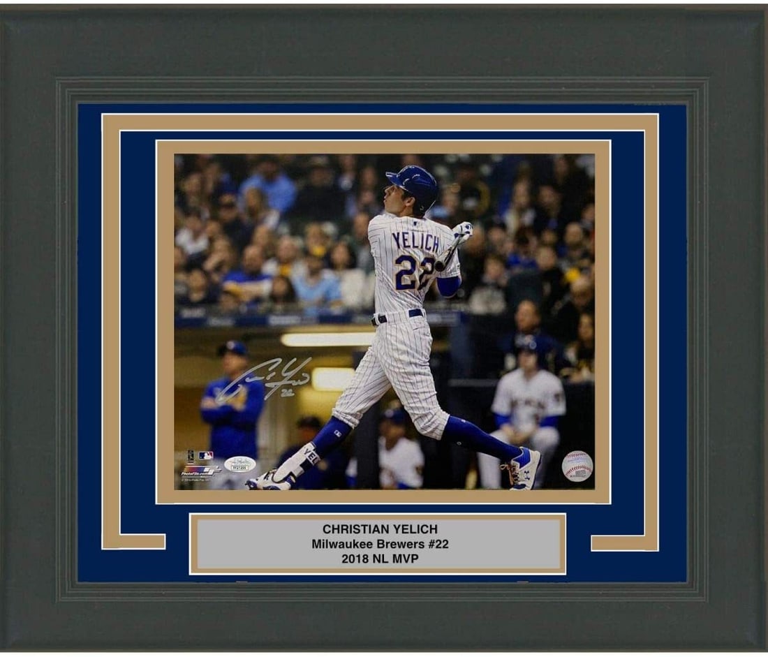 Framed Christian Yelich Autographed 11x14 Photo Milwaukee Brewers JSA COA: Framed Christian Yelich Autographed 11x14 Photo Milwaukee Brewers JSA COA This professionally framed and matted 11x14 photo of Christian Yelich, a standout player for the Milwaukee Brewers, is an exqu