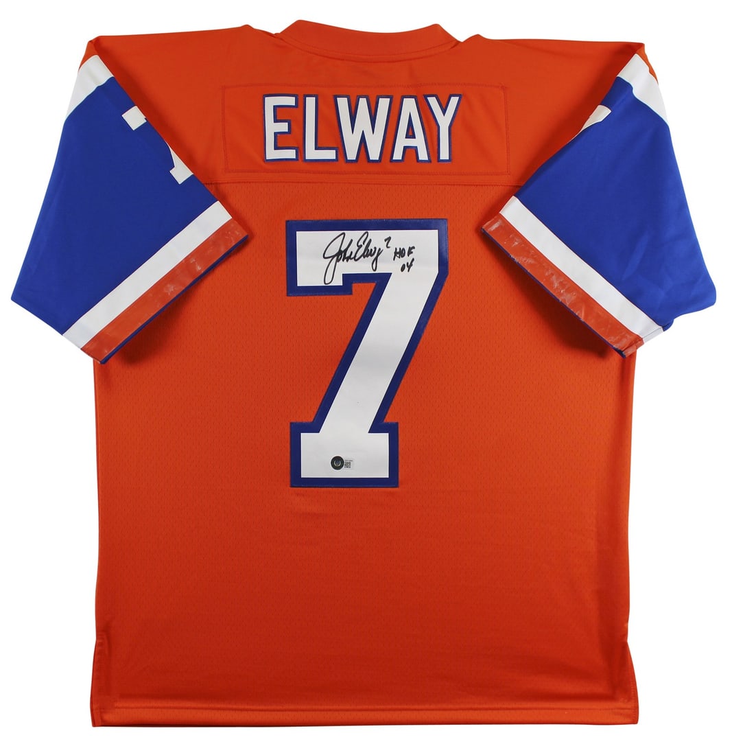 John Elway Signed Mitchell and Ness Broncos Orange 1994 Alternate Jersey Beckett: John Elway Signed Mitchell and Ness Broncos Orange 1994 Alternate Jersey Beckett Autographed orange 1994 alternate Mitchell & Ness jersey personally signed by John Elway of the Denver Broncos with the