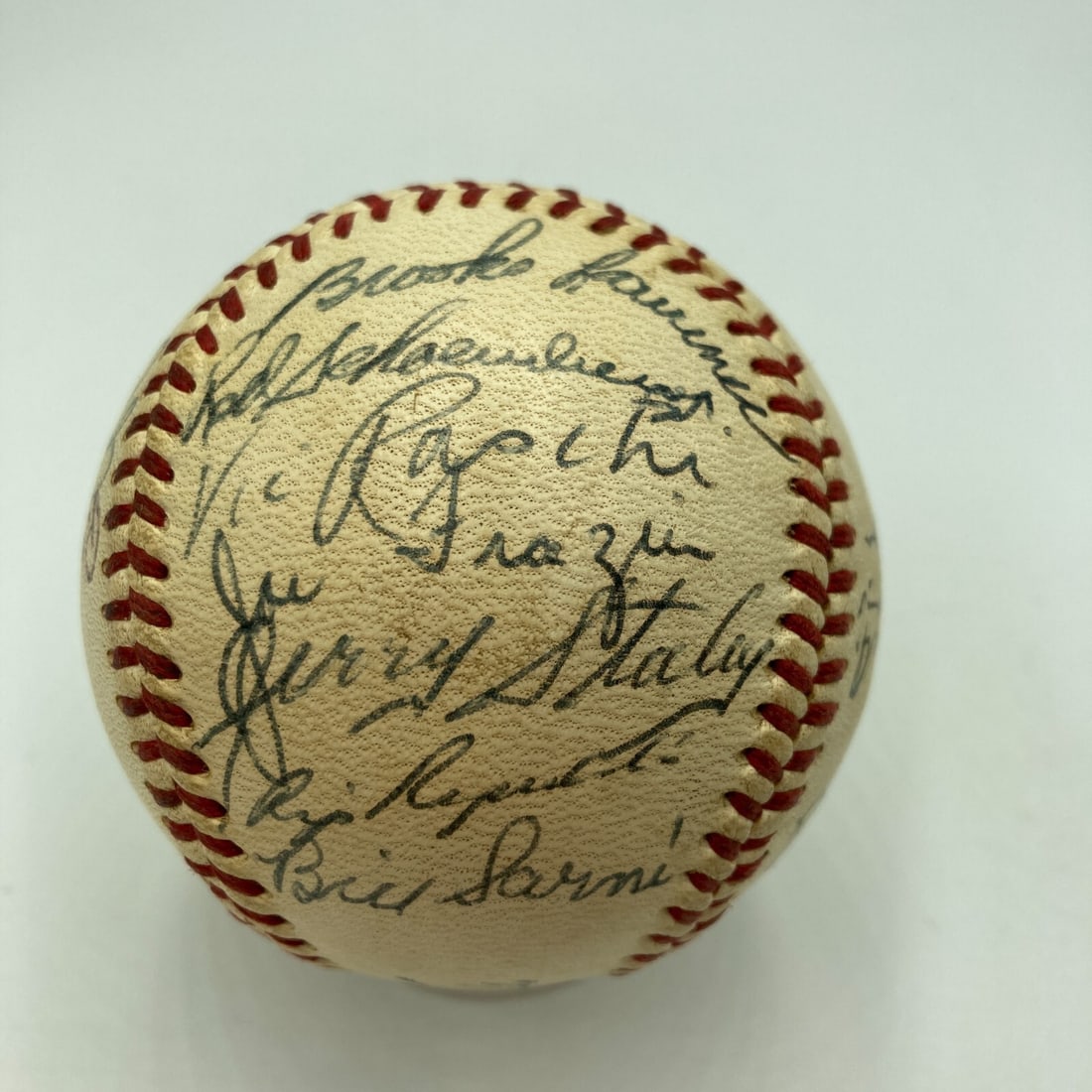1954 St. Louis Cardinals Team Signed Baseball with Stan Musial Beckett Authenticated: 1954 St. Louis Cardinals Team Signed Baseball with Stan Musial Beckett Authenticated This is a 1954 St. Louis Cardinals Team Signed Autograph Baseball, featuring the legendary Stan Musial. The ball in
