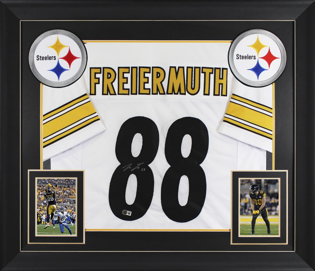 Framed White Pro Style Jersey Signed by Pat Freiermuth Beckett Witnessed: Framed White Pro Style Jersey Signed by Pat Freiermuth Beckett Witnessed This autographed white pro style framed jersey has been personally signed by Pat Freiermuth of the Pittsburgh Steelers. It is a