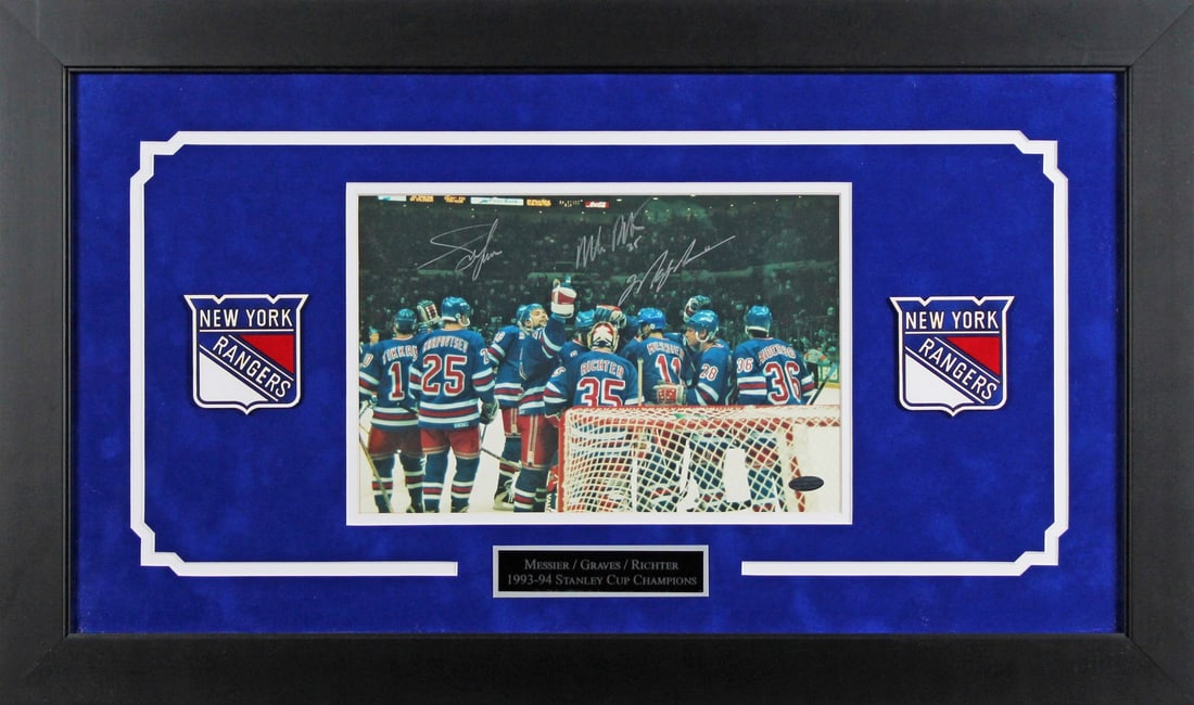 Framed 8.5x11 New York Rangers Photo Signed by Richter Messier Graves: Framed 8.5x11 New York Rangers Photo Signed by Richter Messier Graves Original framed photo signed by Mike Richter, Mark Messier, and Adam Graves of the New York Rangers. This pre-owned piece includes