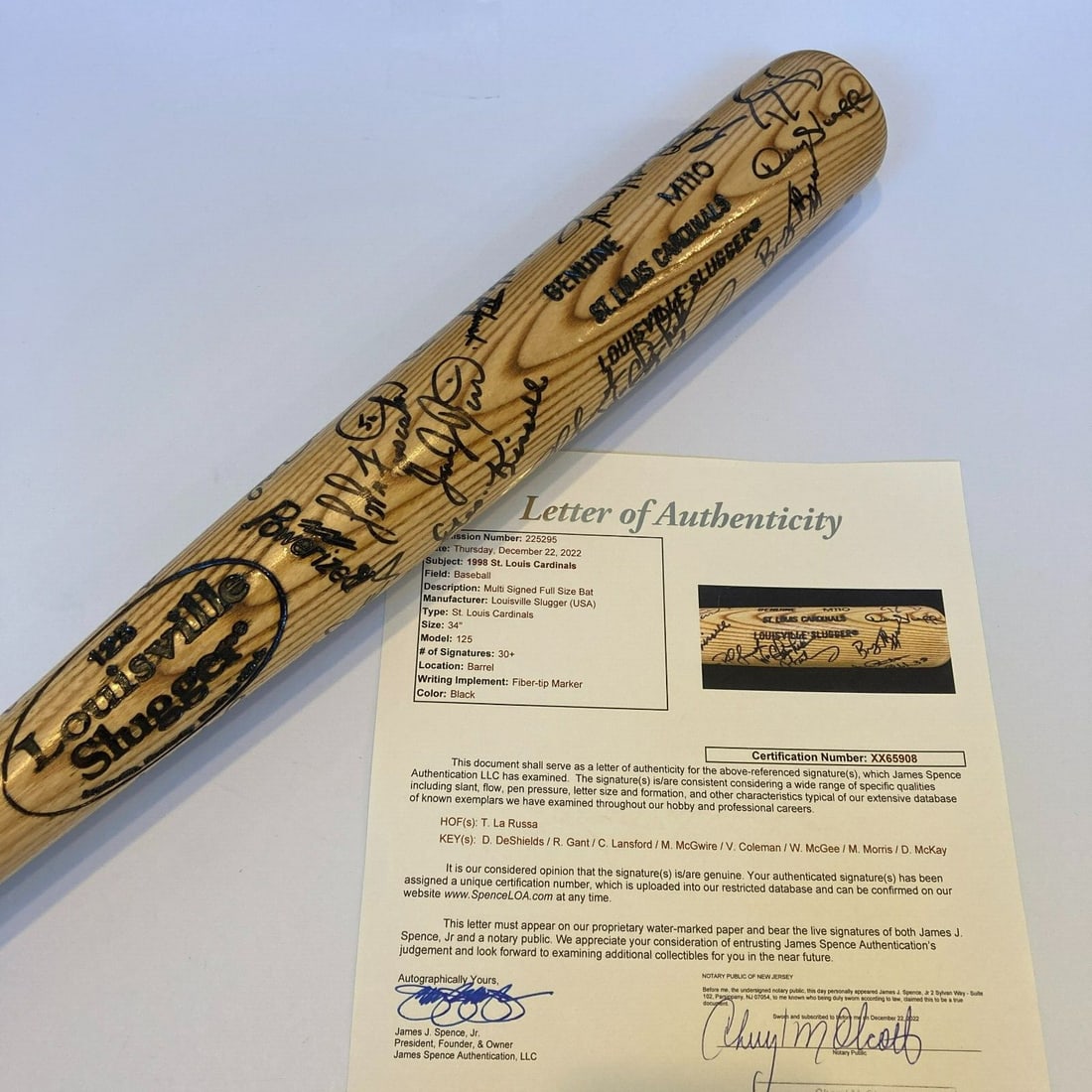 Mark McGwire 1998 Signed Louisville Slugger Bat with 30+ Team Signatures JSA: Mark McGwire 1998 Signed Louisville Slugger Bat with 30+ Team Signatures JSA This is a remarkable 1998 St. Louis Cardinals team-signed Louisville Slugger baseball bat featuring the iconic Mark McGwire