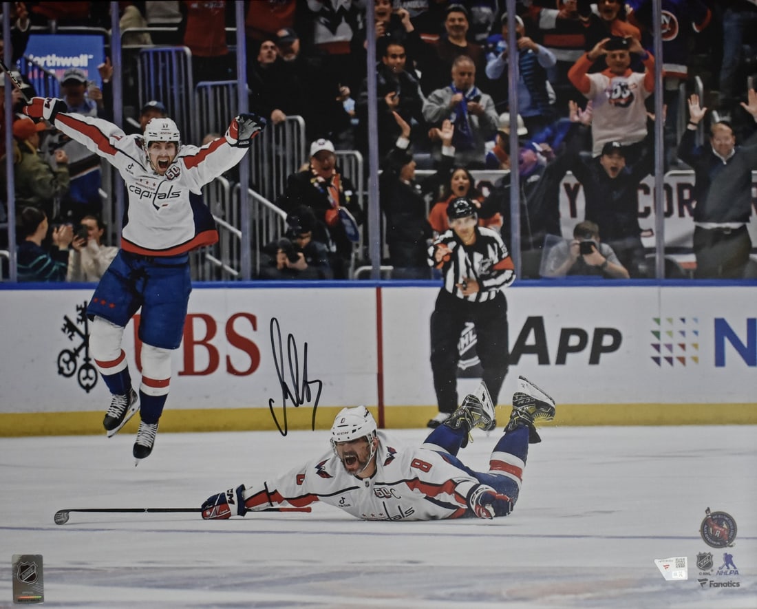 Fanatics Alex Ovechkin Autographed Capitals 16x20 Goal 895 Photo: Fanatics Alex Ovechkin Autographed Capitals 16x20 Goal 895 Photo Original Alex Ovechkin signed 16x20 photo commemorating his 895th goal with the Capitals. This pre-owned hockey collectible is an autog