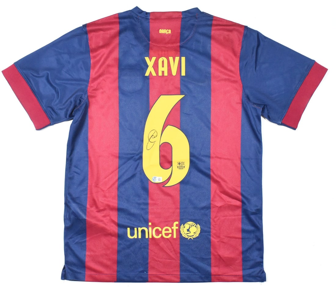 Xavi FC Barcelona Home Jersey Signed Beckett Hologram: Xavi FC Barcelona Home Jersey Signed Beckett Hologram This is an original FC Barcelona home soccer jersey, featuring the number 6 and signed by Xavi. The jersey includes a Beckett hologram for verific