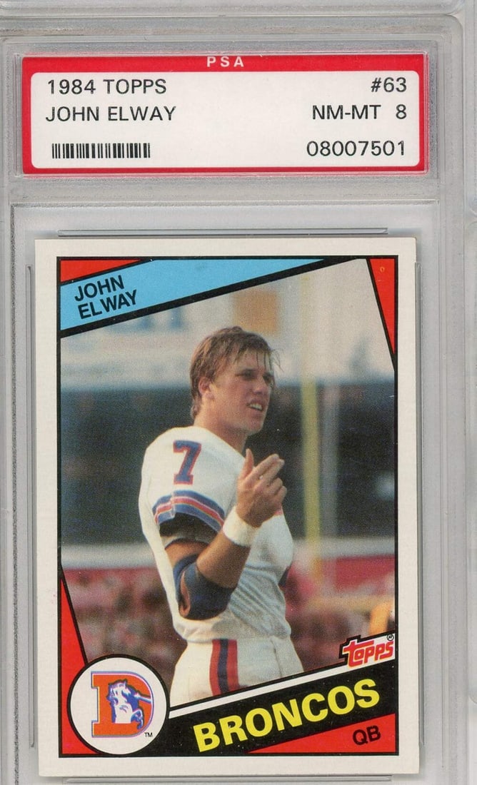 PSA 8 John Elway 1984 Topps #63 Rookie Football Card: PSA 8 John Elway 1984 Topps #63 Rookie Football Card Original 1984 Topps John Elway #63 rookie football card, professionally graded PSA 8 NM-MT and encapsulated by Professional Sports Authenticator. T