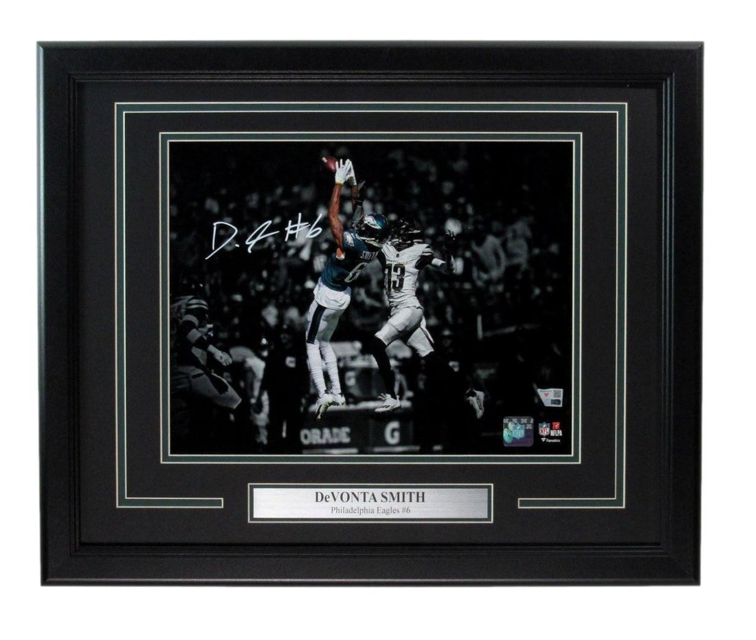 Framed DeVonta Smith autograph 11x14 Eagles photo Fanatics Authentic: Framed DeVonta Smith autograph 11x14 Eagles photo Fanatics Authentic This framed 11x14 photo features the autograph of DeVonta Smith of the Philadelphia Eagles. Authenticated by Fanatics Authentic, th