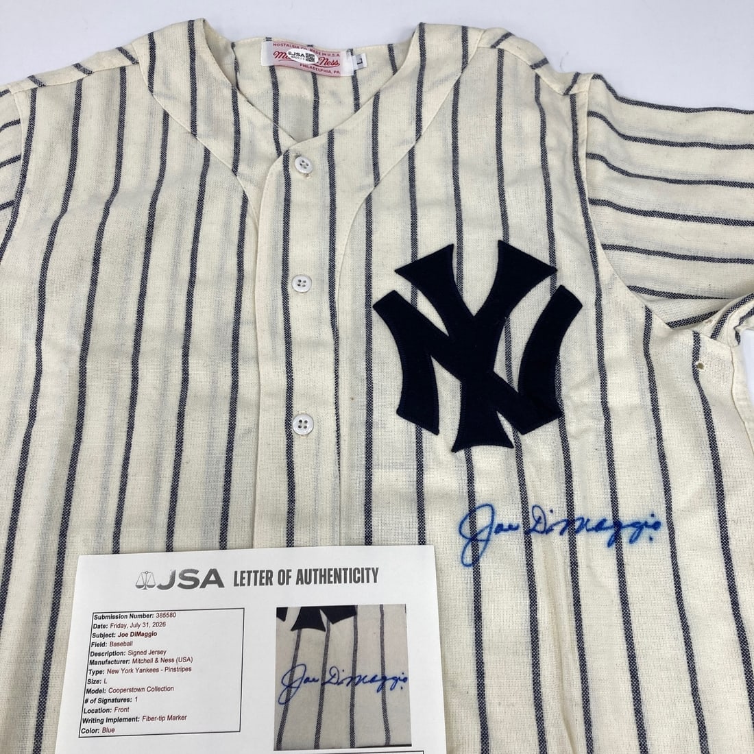 Mitchell and Ness Yankees Joe DiMaggio Autographed Jersey JSA COA: Mitchell and Ness Yankees Joe DiMaggio Autographed Jersey JSA COA Pre-owned Mitchell & Ness New York Yankees jersey signed by Joe DiMaggio. This original autographed baseball collectible includes a fu