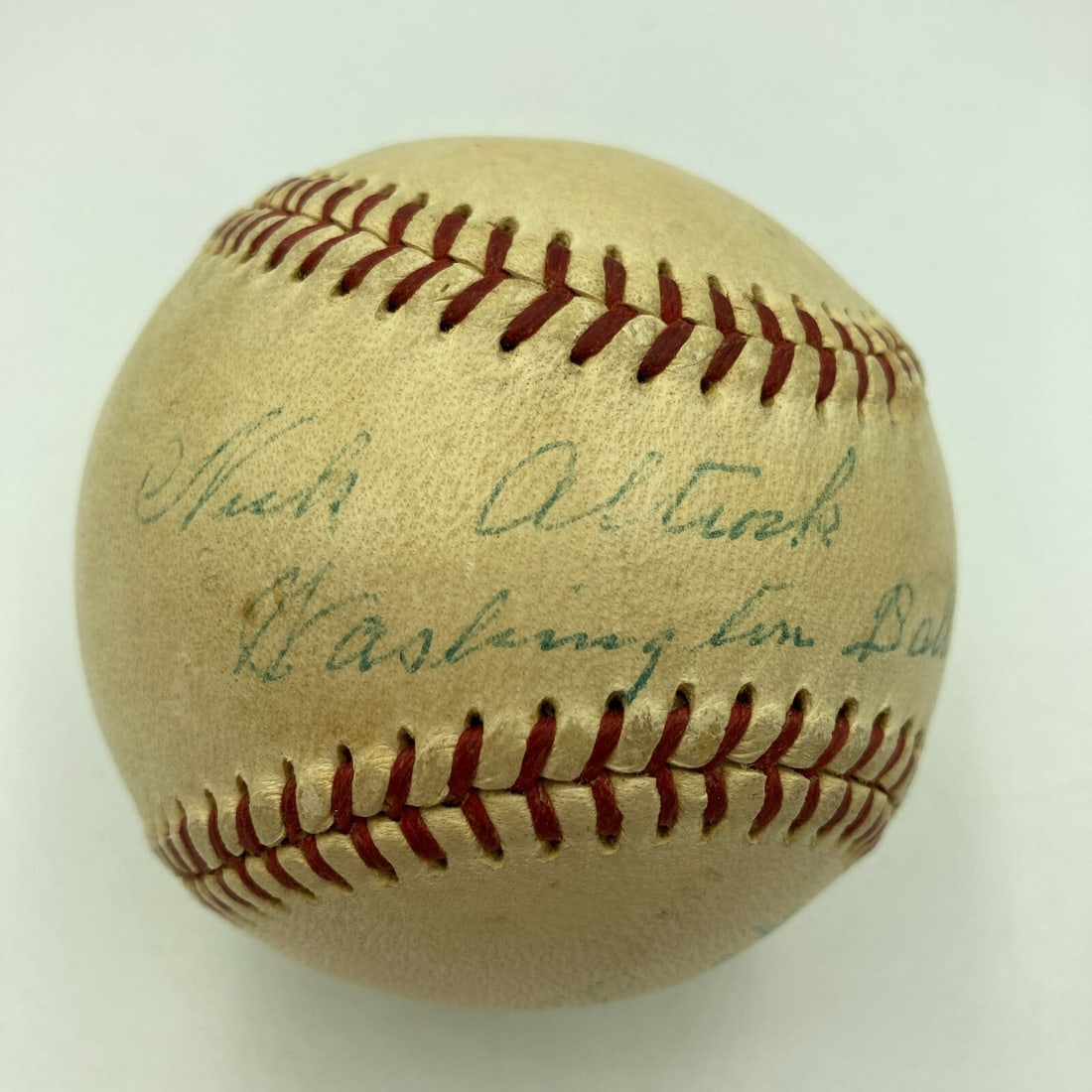 Rare Nick Altrock Inscribed 1950's Baseball with JSA COA: Rare Nick Altrock Inscribed 1950's Baseball with JSA COA This unique baseball features a single signature from the rare Nick Altrock, known for his time with the Washington Ball Club in the 1950s. It 