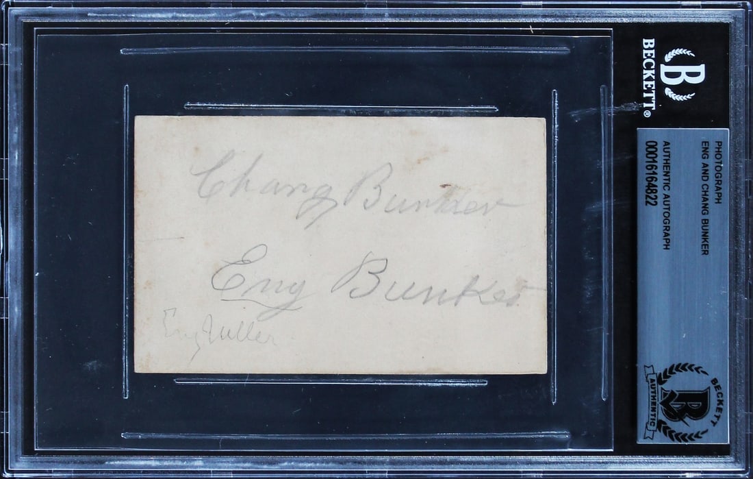 Eng & Chang Bunker Signed Photo 2.35x3.85 Authentic Beckett Slabbed: Eng & Chang Bunker Signed Photo 2.35x3.85 Authentic Beckett Slabbed This authentic signed photo features the iconic conjoined twins, Eng & Chang Bunker. Measuring 2.35x3.85 inches, this item has been