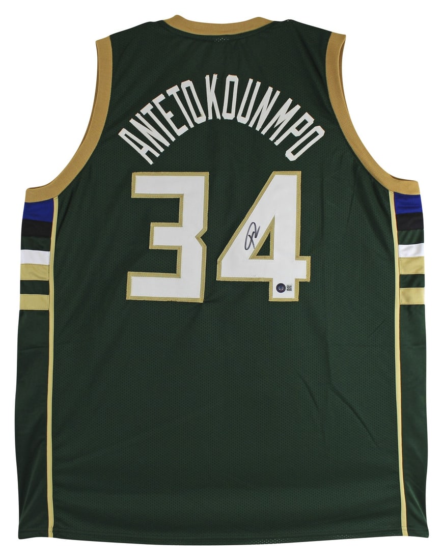 BAS Witnessed Giannis Antetokounmpo Signed Milwaukee Bucks Green Jersey: BAS Witnessed Giannis Antetokounmpo Signed Milwaukee Bucks Green Jersey Authentic signed green pro style jersey personally autographed by Giannis Antetokounmpo of the Milwaukee Bucks. This original au