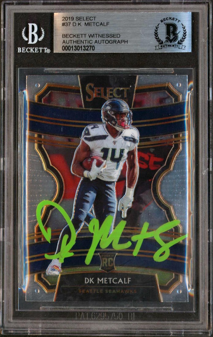 DK Metcalf Signed 2019 Select #37 Rookie Card Beckett Slabbed: DK Metcalf Signed 2019 Select #37 Rookie Card Beckett Slabbed This authentic 2019 Select #37 rookie card has been personally signed by DK Metcalf of the Seattle Seahawks. The card is slabbed and has b