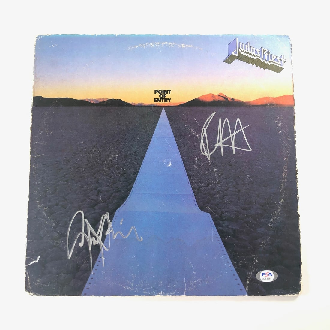 Judas Priest Point of Entry Signed Vinyl Cover by Halford Tipton PSA/DNA: Judas Priest Point of Entry Signed Vinyl Cover by Halford Tipton PSA/DNA This Point of Entry vinyl cover features authentic autographs from Rob Halford and Glenn Tipton of the iconic band Judas Priest