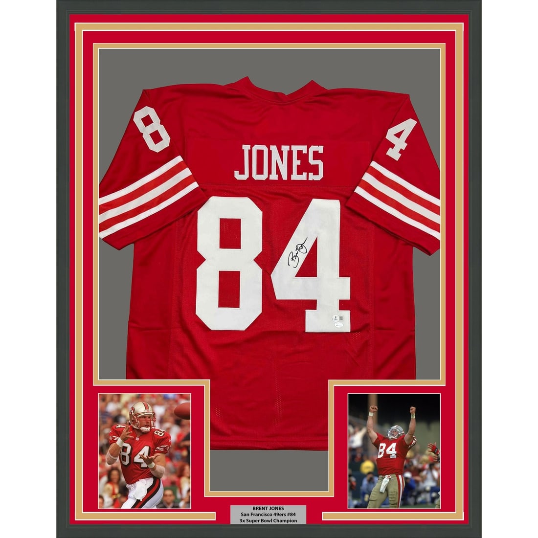 35x39 Framed Brent Jones Signed 49ers Red Football Jersey JSA: 35x39 Framed Brent Jones Signed 49ers Red Football Jersey JSA Professionally framed autographed Brent Jones red jersey display with matting and two 5x7 photos. This original NFL memorabilia piece is r