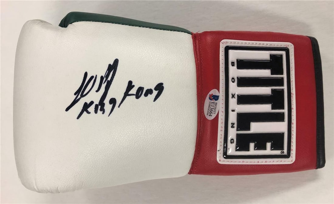 Boxing Glove Signed by Luis Ortiz King Kong with Beckett BAS COA: Boxing Glove Signed by Luis Ortiz King Kong with Beckett BAS COA This Title Boxing glove is personally signed by Luis Ortiz, also known as "King Kong." The glove is an original piece and comes with a 