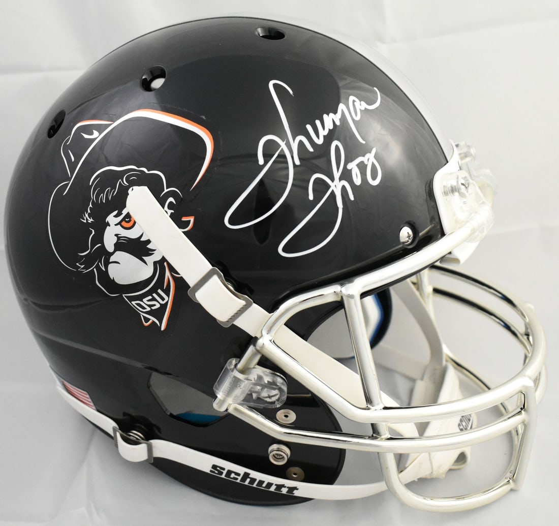 Oklahoma State Full Size Schutt Helmet Signed by Thurman Thomas JSA Authenticated: Oklahoma State Full Size Schutt Helmet Signed by Thurman Thomas JSA Authenticated This is a pre-owned, full-size Schutt helmet autographed by Thurman Thomas, representing the Oklahoma State football t