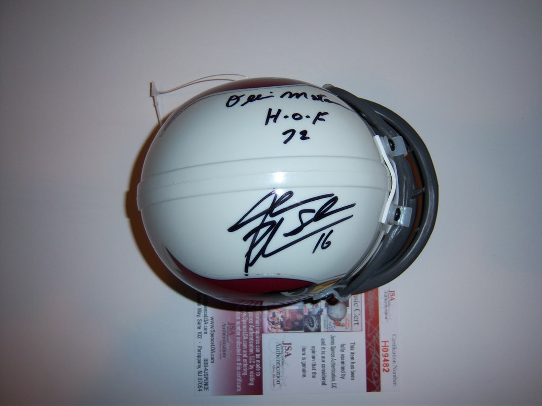 Signed NFL Mini Helmet Matson Trippi Plummer JSA COA: Signed NFL Mini Helmet Matson Trippi Plummer JSA COA This mini football helmet is signed by Ollie Matson, Charley Trippi, and Jake Plummer. The item is an original piece, accompanied by JSA/COA authen
