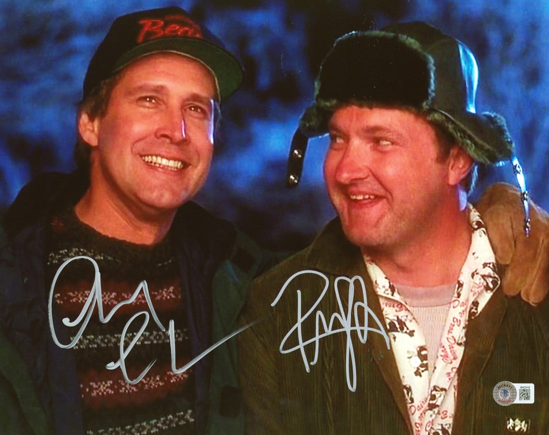 Chevy Chase Randy Quaid Signed 11x14 Photo National Lampoon Christmas Vacation BAS Authenticated: Chevy Chase Randy Quaid Signed 11x14 Photo National Lampoon Christmas Vacation BAS Authenticated This autographed 11x14 photograph features Chevy Chase and Randy Quaid from the beloved film 'National 
