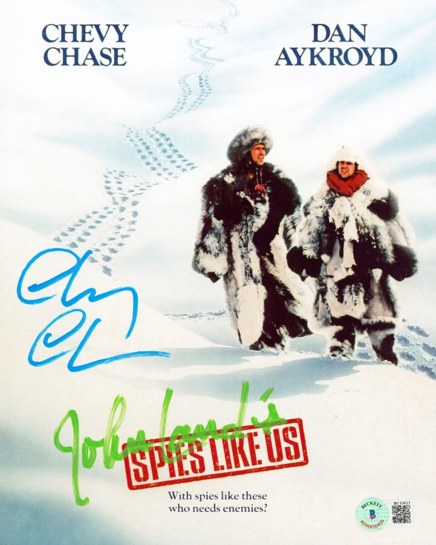 Chevy Chase John Landis Spies Like Us Signed 8x10 Photo Beckett Authentic: Chevy Chase John Landis Spies Like Us Signed 8x10 Photo Beckett Authentic This authentic 8x10 photograph features the signatures of Chevy Chase and John Landis, both notable figures from the film "Spi
