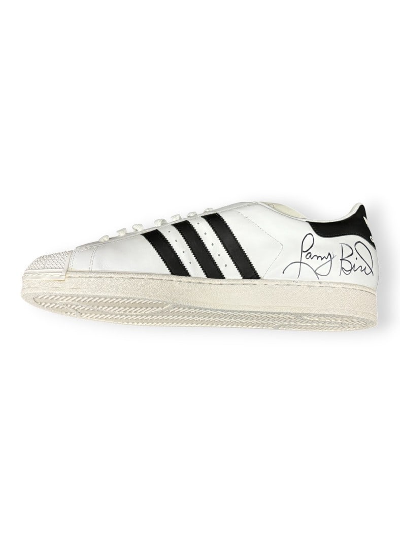Adidas Size 17 Shoe Signed by Larry Bird with PSA Authentication: Adidas Size 17 Shoe Signed by Larry Bird with PSA Authentication This is a size 17 Adidas shoe autographed by basketball legend Larry Bird. The shoe features the signature of Larry Bird and is authent