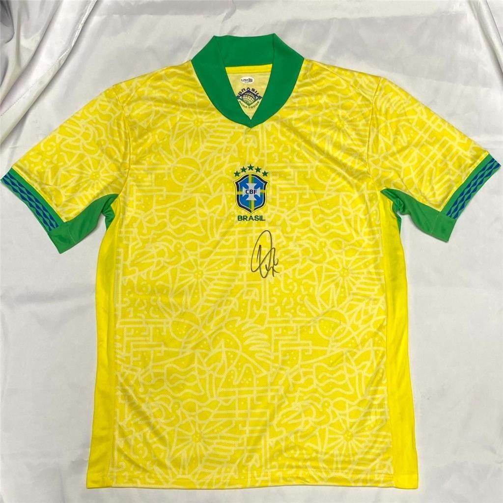 Brazil soccer jersey signed by Vinicius Junior JSA: Brazil soccer jersey signed by Vinicius Junior JSA This is a pre-owned Brazil national team jersey signed by Vinicius Junior, the renowned Real Madrid soccer player. The autograph has been authenticat