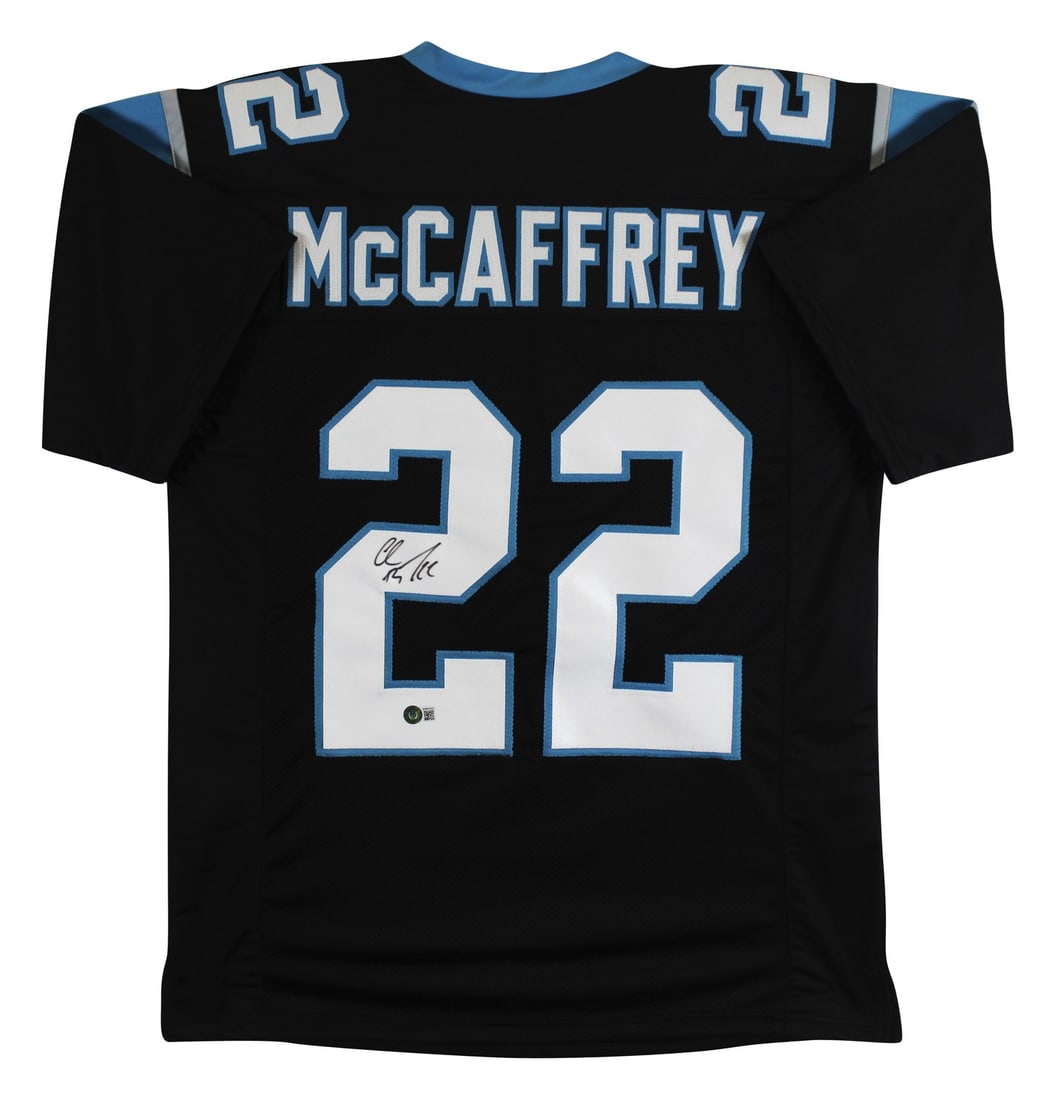 Christian McCaffrey signed black jersey Beckett BAS witnessed authentic: Christian McCaffrey signed black jersey Beckett BAS witnessed authentic Authentic signed black pro style jersey personally autographed by Christian McCaffrey of the Carolina Panthers. This original au