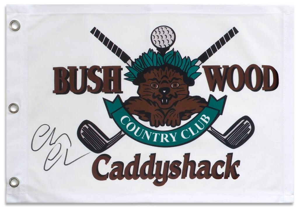 Chevy Chase Signed Caddyshack 18x13 Golf Flag with COA: Chevy Chase Signed Caddyshack 18x13 Golf Flag with COA This is an original Chevy Chase signed Caddyshack Bushwood golf pin flag, measuring 18x13 inches. The flag features the iconic Caddy Shack movie 