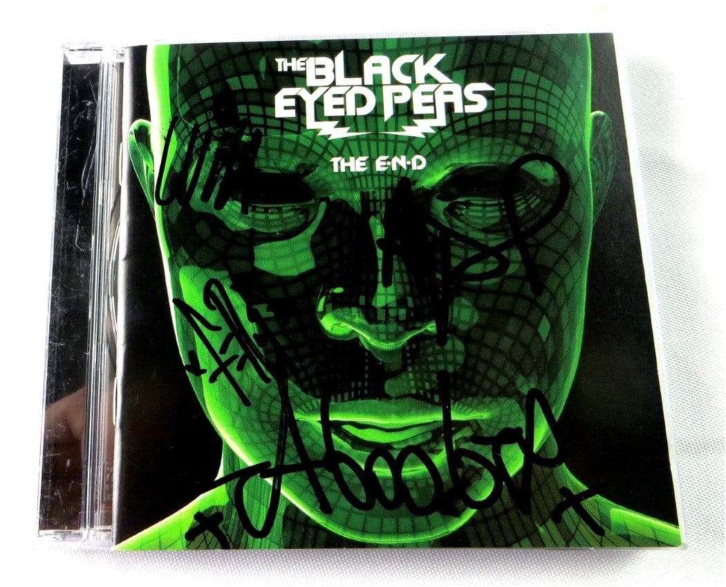 Autographed The E-N-D CD Booklet by Black-Eyed Peas JSA Authenticated: Autographed The E-N-D CD Booklet by Black-Eyed Peas JSA Authenticated This is an original CD booklet for The Black-Eyed Peas' album "The E.N.D," autographed by all four band members: will.i.am, apl.de
