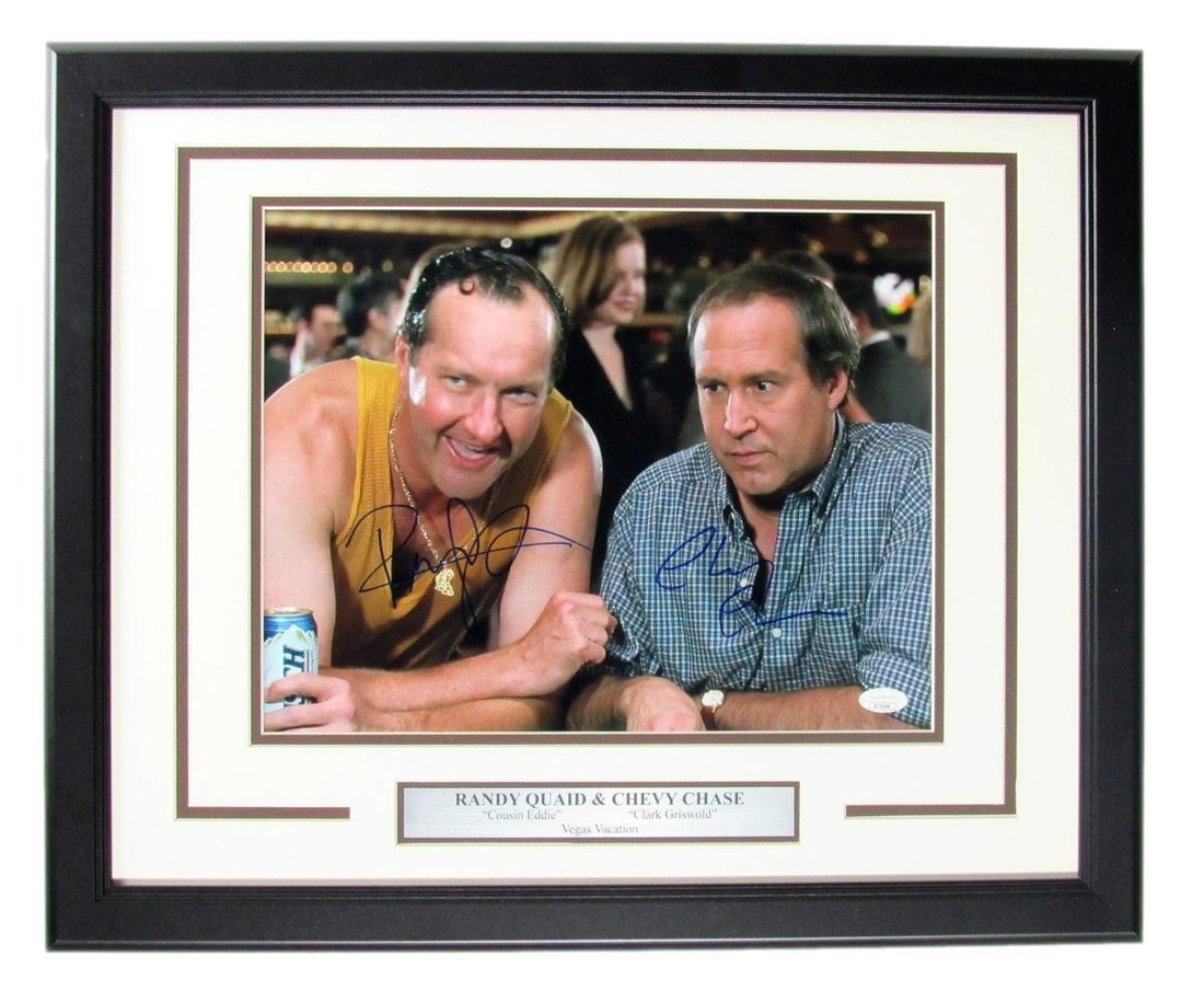 Framed 11x14 Vegas Vacation Photo Signed by Chevy Chase and Randy Quaid JSA: Framed 11x14 Vegas Vacation Photo Signed by Chevy Chase and Randy Quaid JSA This striking framed photo features dual autographs from Chevy Chase and Randy Quaid, captured during their iconic roles in 