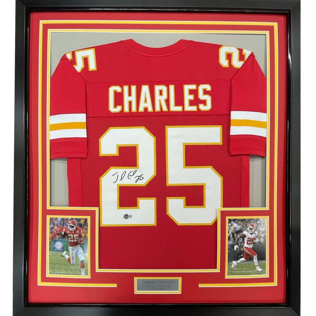 Jamaal Charles signed framed Chiefs red jersey 35x39 JSA COA: Jamaal Charles signed framed Chiefs red jersey 35x39 JSA COA Professionally framed and matted signed Jamaal Charles Kansas City red jersey display with two 5x7 photos. This original football collectib
