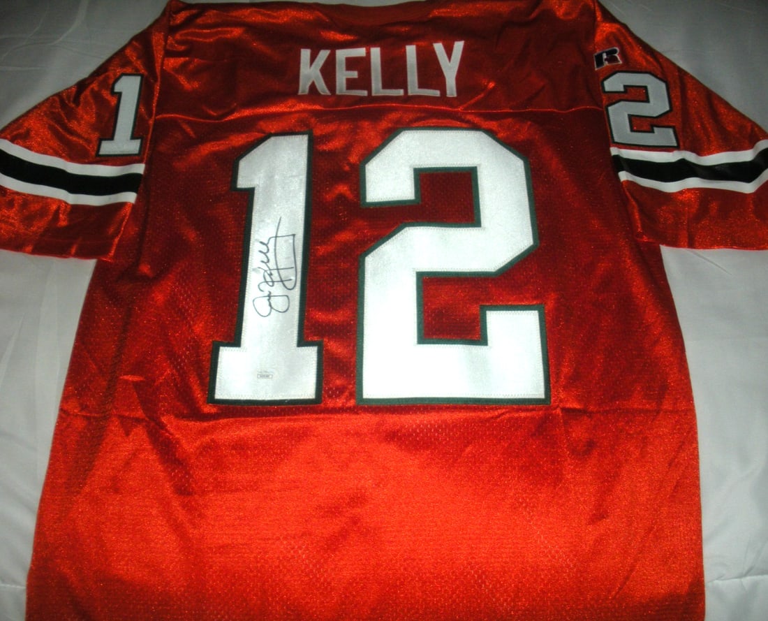 Jim Kelly Signed Russell Jersey JSA COA Buffalo Miami Hurricanes Official Licensed: Jim Kelly Signed Russell Jersey JSA COA Buffalo Miami Hurricanes Official Licensed This is an officially licensed Russell jersey signed by Jim Kelly, featuring his association with the Buffalo Bills a