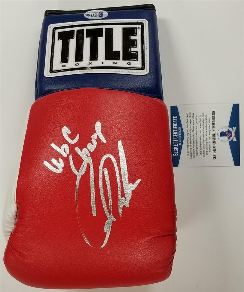 Boxing Glove Signed by Cecilia Braekhus with Beckett BAS Authentication (1 of 2)