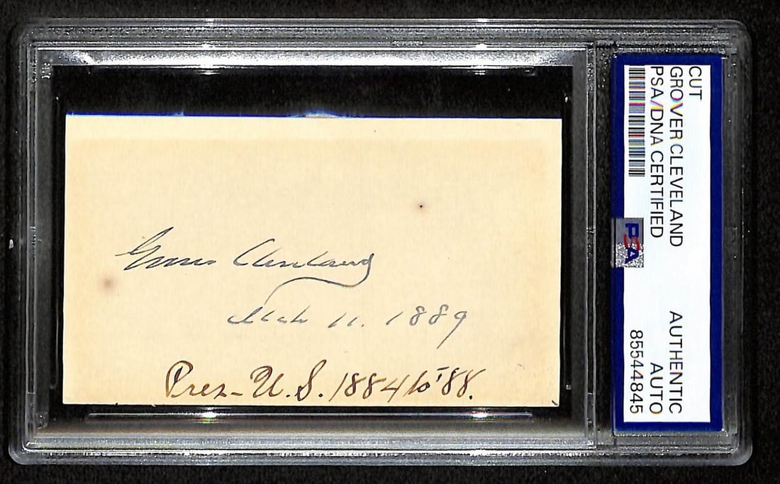 1889 Grover Cleveland autograph cut card PSA DNA certified: 1889 Grover Cleveland autograph cut card PSA DNA certified Original signed cut card from President Grover Cleveland, dated 1889 and encapsulated by PSA/DNA. The autograph is written in ink on an off-w