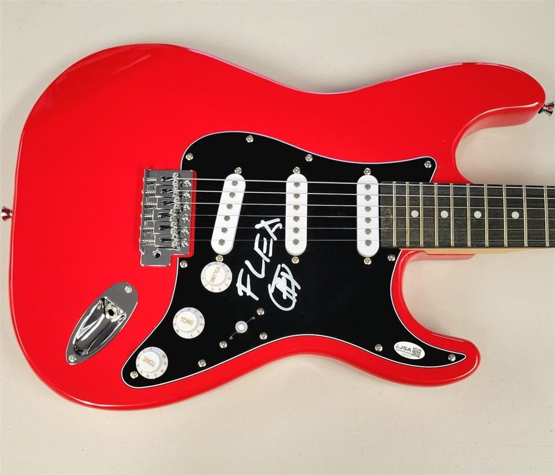 Full Size Glarry Electric Guitar Signed by Flea with JSA Authentication: Full Size Glarry Electric Guitar Signed by Flea with JSA Authentication This full-size Glarry electric guitar and guitar pick have been hand-signed by Flea of the Red Hot Chili Peppers. The autograph 