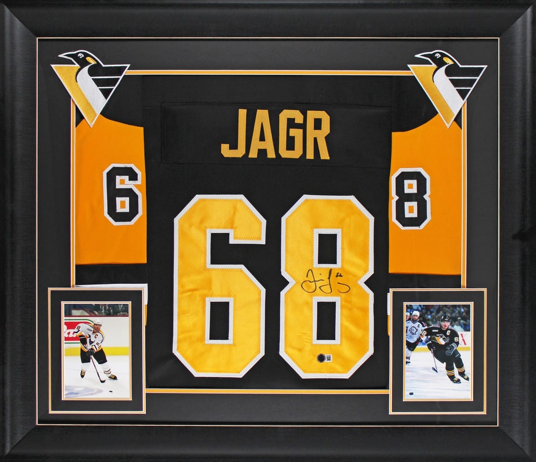 Jaromir Jagr Signed Black Framed Jersey Pittsburgh Penguins Beckett Authenticated: Jaromir Jagr Signed Black Framed Jersey Pittsburgh Penguins Beckett Authenticated This authentic black pro style framed jersey is a remarkable collectible featuring the iconic Jaromir Jagr, who has pe