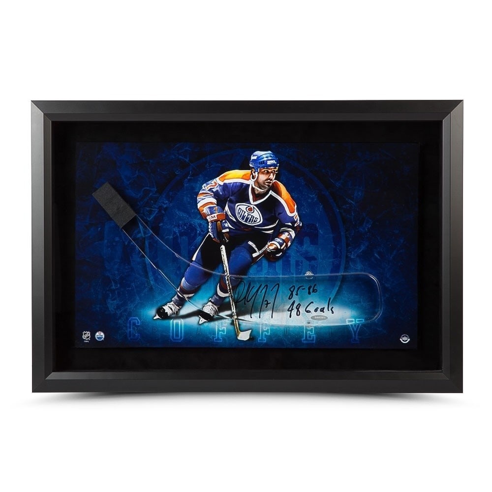 Paul Coffey Autographed 16x24 Framed Photo Upper Deck Oilers: Paul Coffey Autographed 16x24 Framed Photo Upper Deck Oilers Celebrate the legacy of hockey legend Paul Coffey with this 16X24 framed photo featuring his iconic acrylic stick blade. This original piec