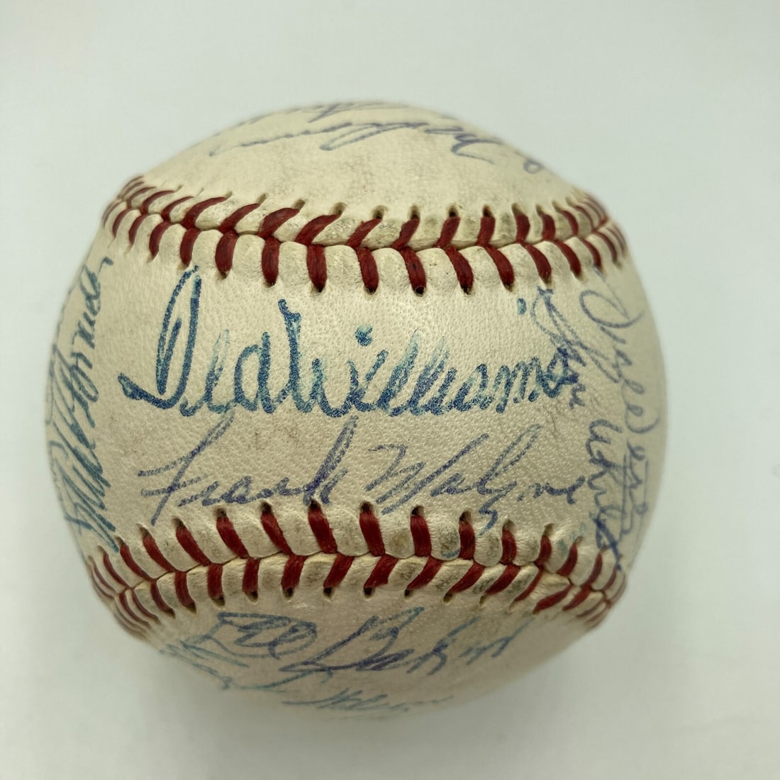 1959 Boston Red Sox Team Signed OAL Baseball with 28 Signatures: 1959 Boston Red Sox Team Signed OAL Baseball with 28 Signatures This official American League baseball from 1959 features twenty-eight blue-ink signatures of the Boston Red Sox team, with an average q