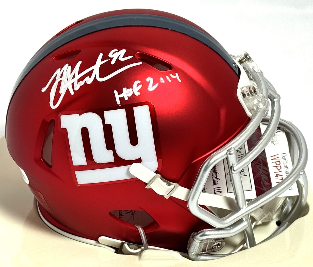 JSA Michael Strahan Autographed Giants Blaze Speed Mini Helmet HOF White: JSA Michael Strahan Autographed Giants Blaze Speed Mini Helmet HOF White Pre-owned Blaze Speed mini helmet signed by Michael Strahan and featuring a HOF inscription. This Giants collectible is made in