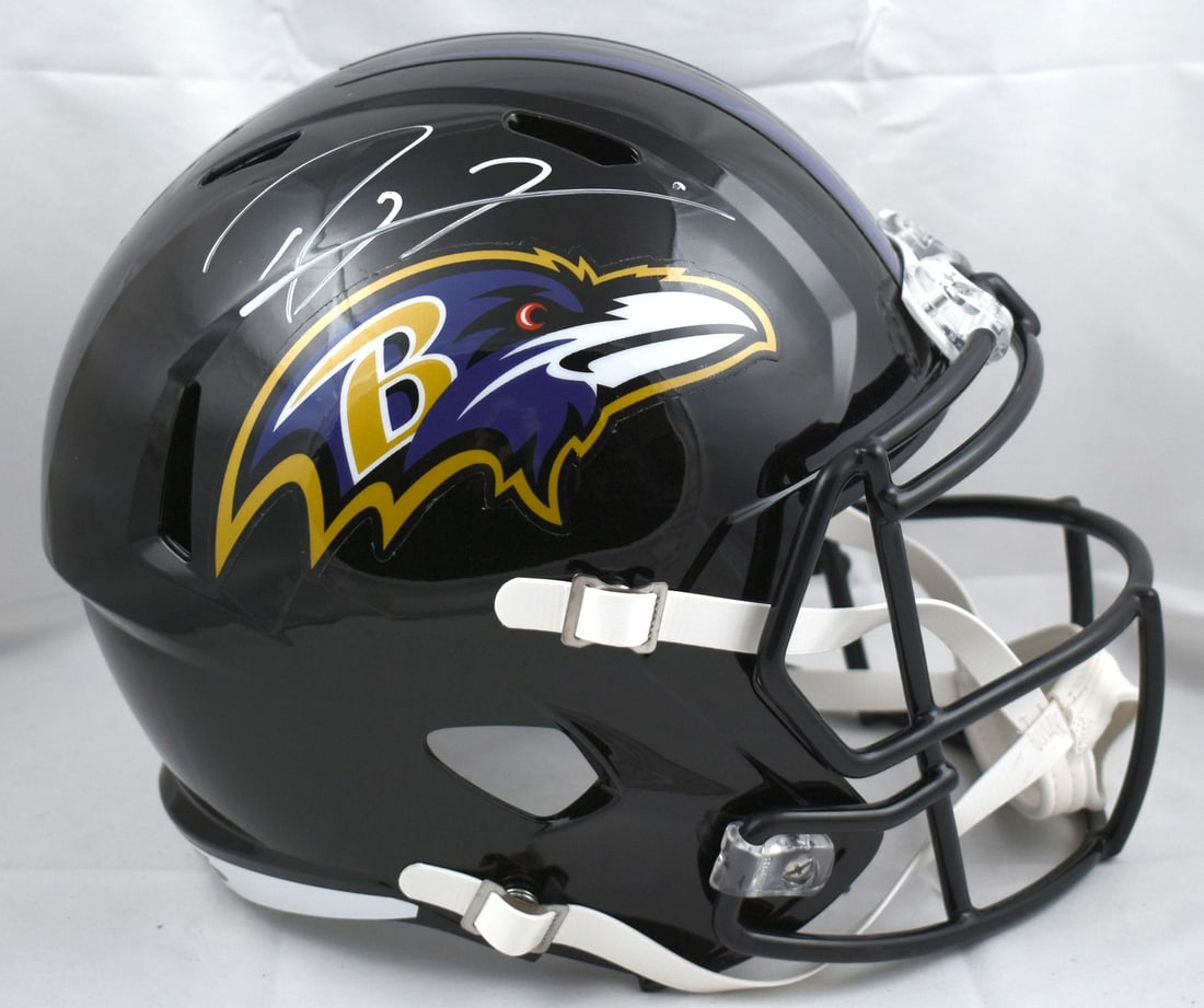 Beckett Hologram Ray Lewis Signed Ravens Full Size Speed Helmet: Beckett Hologram Ray Lewis Signed Ravens Full Size Speed Helmet Autographed Baltimore Ravens full-size Speed helmet signed by Ray Lewis. This pre-owned collectible includes a Beckett Witness hologram.