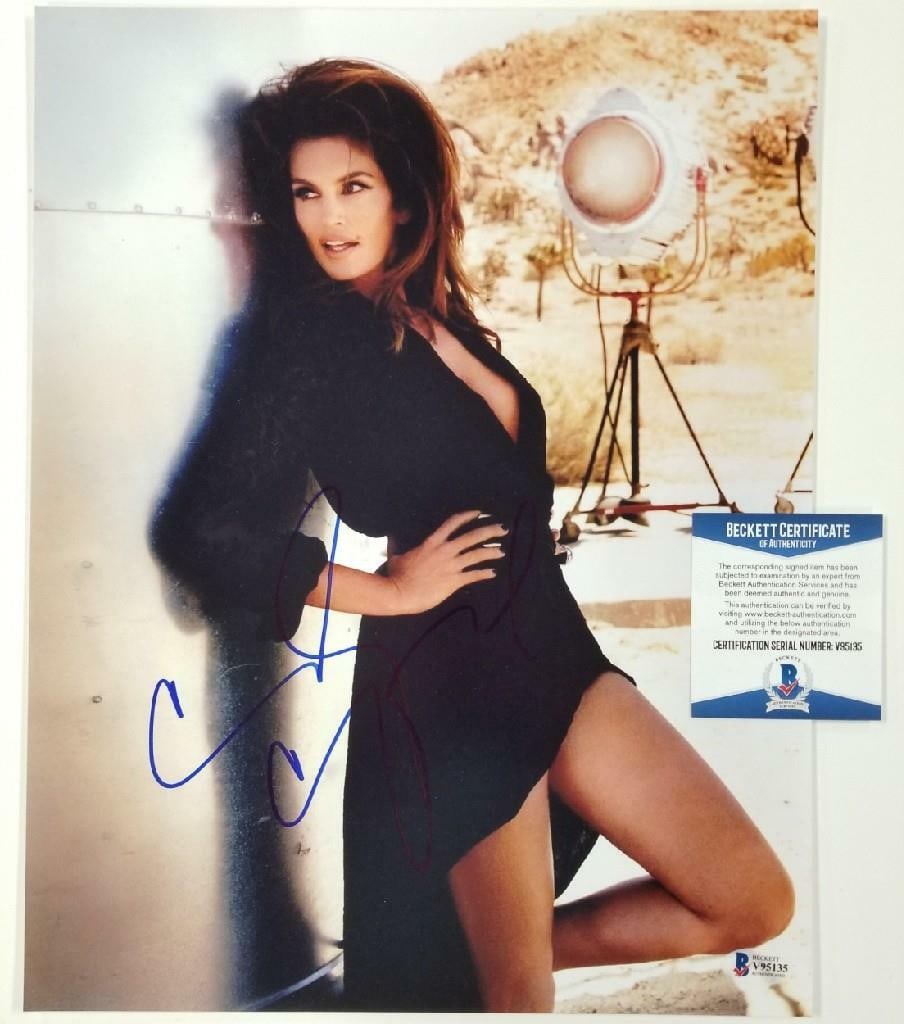 Signed 11x14 Cindy Crawford Photograph Beckett Authenticated Autograph: Signed 11x14 Cindy Crawford Photograph Beckett Authenticated Autograph This original 11x14 photograph features the autograph of actress and model Cindy Crawford. The autograph has been authenticated b