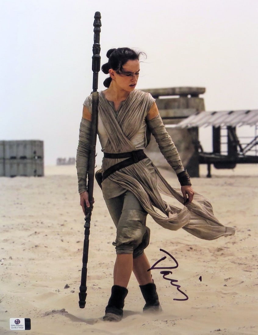 Daisy Ridley Autographed 11x14 Photo Star Wars GAI Certified: Daisy Ridley Autographed 11x14 Photo Star Wars GAI Certified This stunning 11X14 photograph features Daisy Ridley, the iconic actress from Star Wars: The Force Awakens, and is autographed with her aut