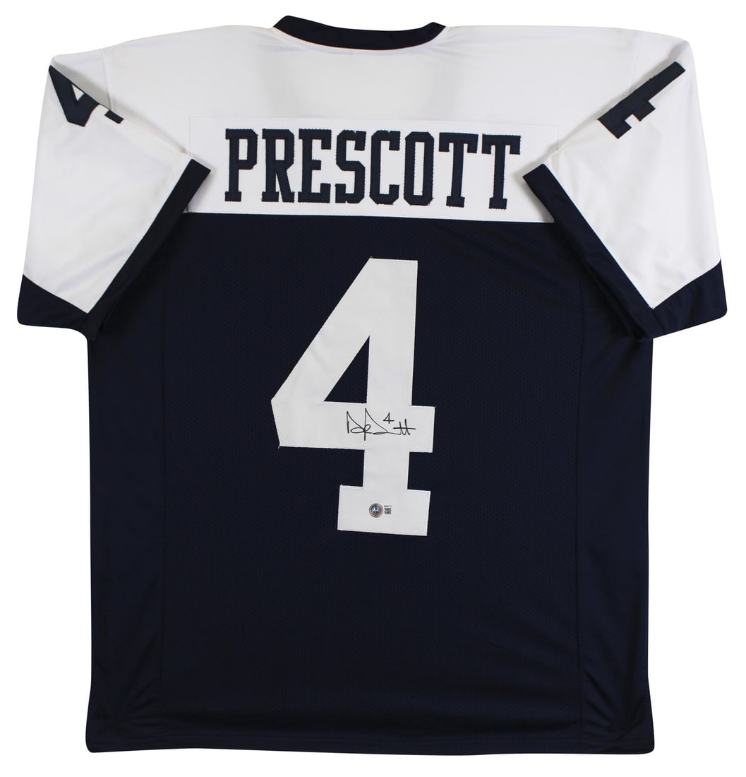 Dak Prescott signed Dallas Cowboys Thanksgiving jersey Beckett BAS witnessed: Dak Prescott signed Dallas Cowboys Thanksgiving jersey Beckett BAS witnessed Authentic Dak Prescott signed navy Thanksgiving pro style jersey. This pre-owned, custom-stitched jersey is a non-branded X