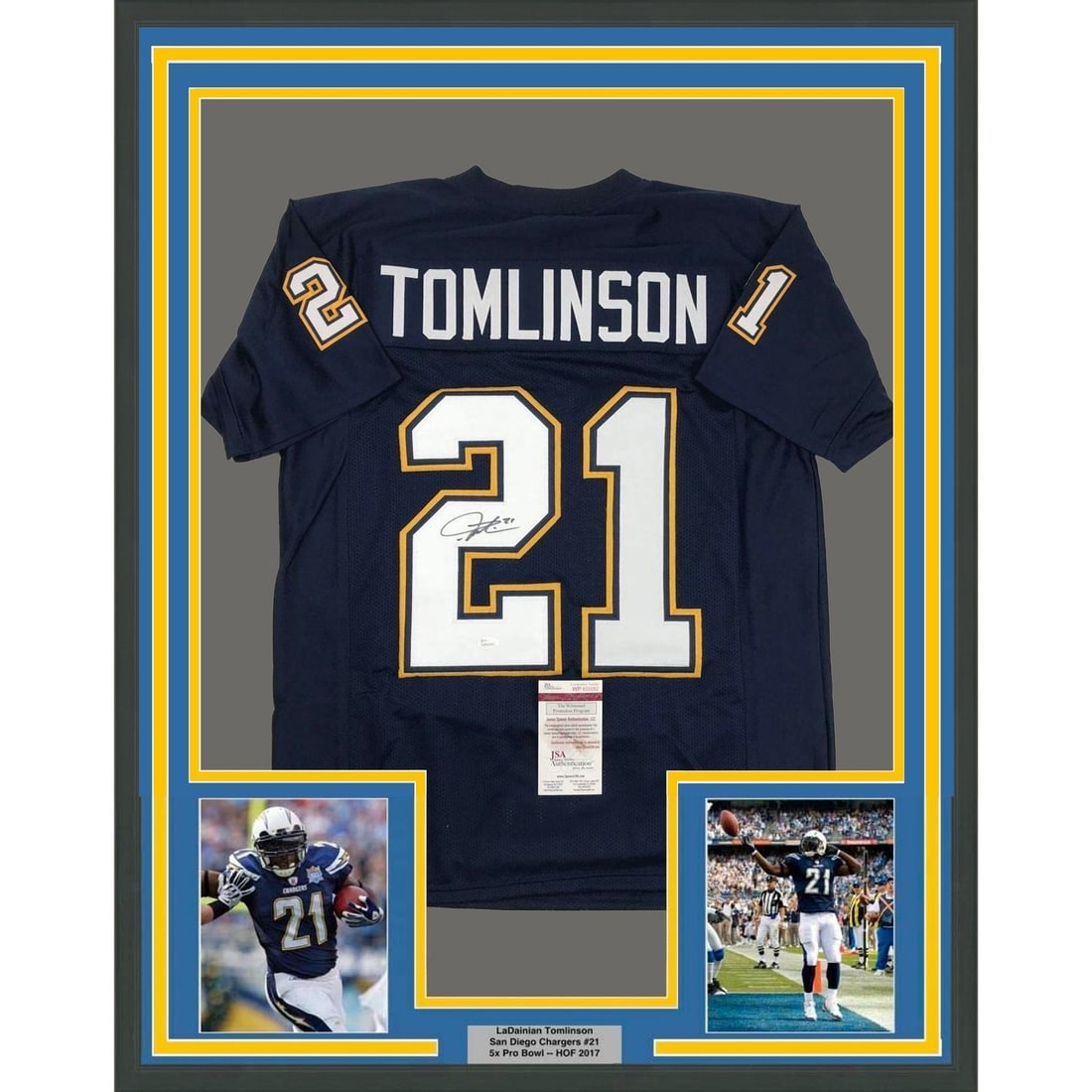 LaDainian Tomlinson autographed framed Chargers jersey with JSA COA 35x39: LaDainian Tomlinson autographed framed Chargers jersey with JSA COA 35x39 Professionally framed and matted original dark blue LaDainian Tomlinson signed jersey display featuring two 5x7 photos. This p