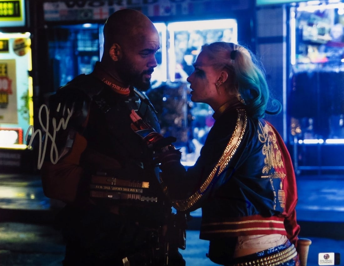 Will Smith Margot Robbie Autographed 11X14 Photo Suicide Squad GAI Certified: Will Smith Margot Robbie Autographed 11X14 Photo Suicide Squad GAI Certified This stunning 11x14 photograph features the autographs of Will Smith and Margot Robbie, capturing a memorable moment from t