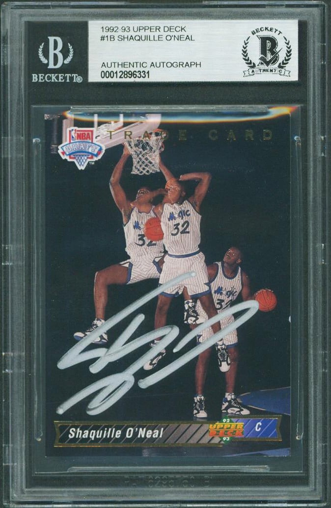 Shaquille O'Neal Signed 1992 Upper Deck Rookie Card Beckett Authenticated: Shaquille O'Neal Signed 1992 Upper Deck Rookie Card Beckett Authenticated This is a signed 1992 Upper Deck #1B rookie card of Shaquille O'Neal, featuring the Orlando Magic. The card has been personall