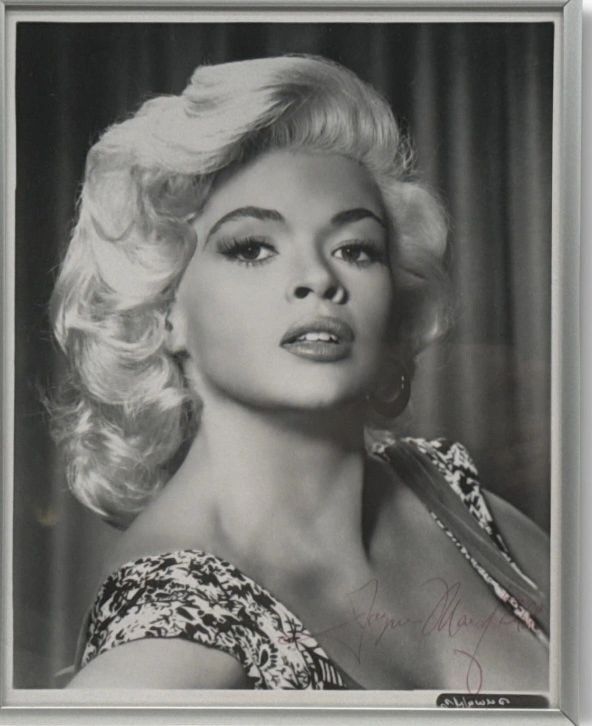 Autographed Jane Mansfield 8x10 Black and White Photo: Autographed Jane Mansfield 8x10 Black and White Photo Black and white photograph of Jane Mansfield, signed in red pen. Presented in a frame and offered in pre-owned excellent condition. Specifications